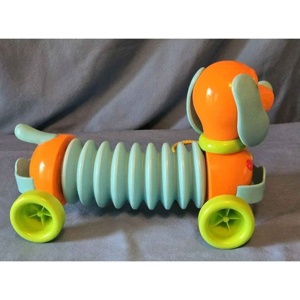 Tomy's  Marley The Musical Dog Plastic Pull Toy For Children 18M+